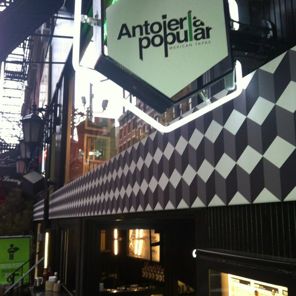 Photo taken at Antojeria La Popular NYC by Angie N. on 3/28/2013