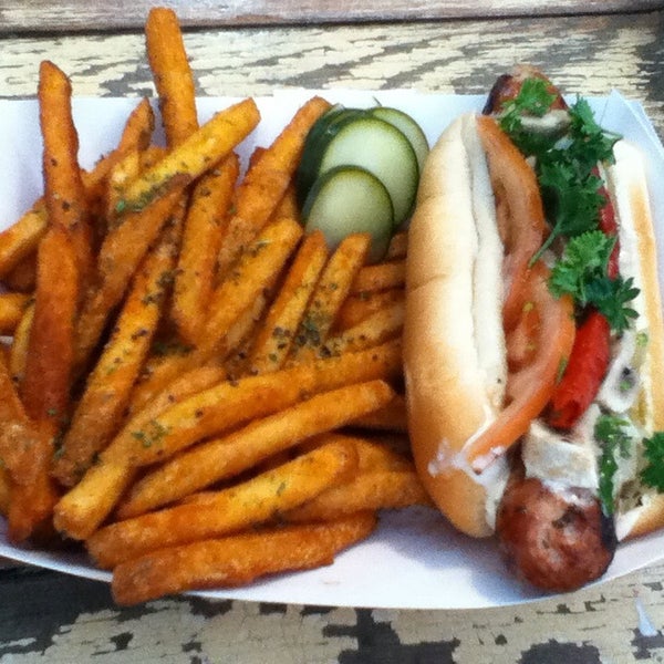 Photo taken at Chicago&#39;s Dog House by Tomás D. on 4/11/2014