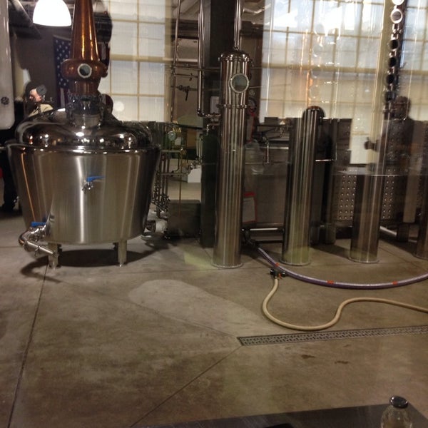 Photo taken at Black Button Distilling by Rick T. on 1/25/2014