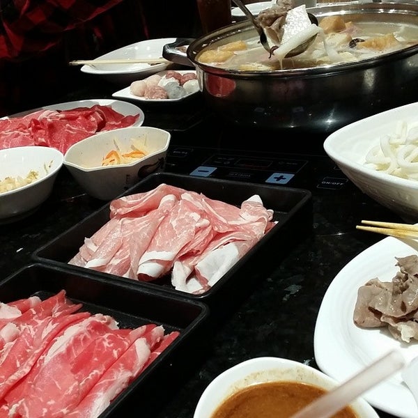 Photo taken at Happy Lamb Hot Pot, Vancouver by Long H. on 8/15/2014