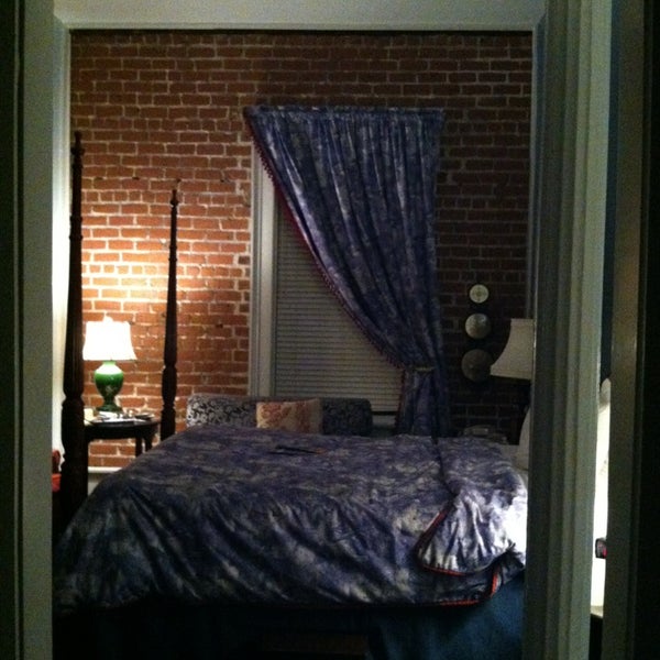 Photo taken at East Bay Inn by Whitney C. on 12/30/2012