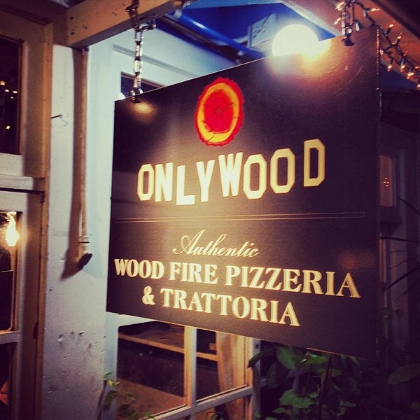 Photo taken at Onlywood Pizzeria Trattoria by Danny M. on 1/1/2014
