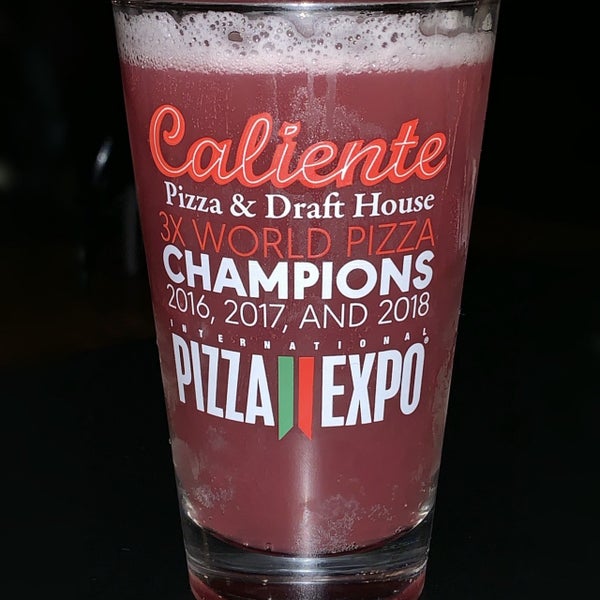 Photo taken at Caliente Pizza &amp; Drafthouse by Harry M. on 7/14/2019
