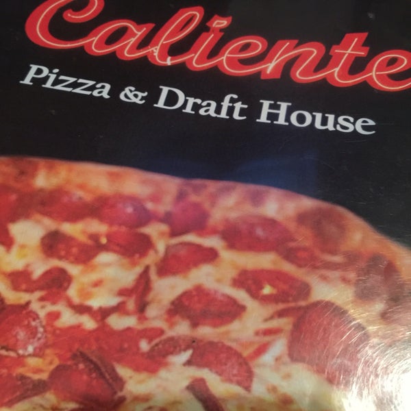 Photo taken at Caliente Pizza &amp; Drafthouse by Harry M. on 6/3/2016