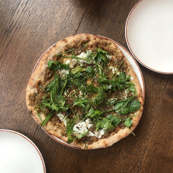 The ground floor level is an airy cafe/ bar serving simple food - the aubergine flatbread is definitely a winner. The downstairs area is a proper restaurant serving dishes designed to be shared