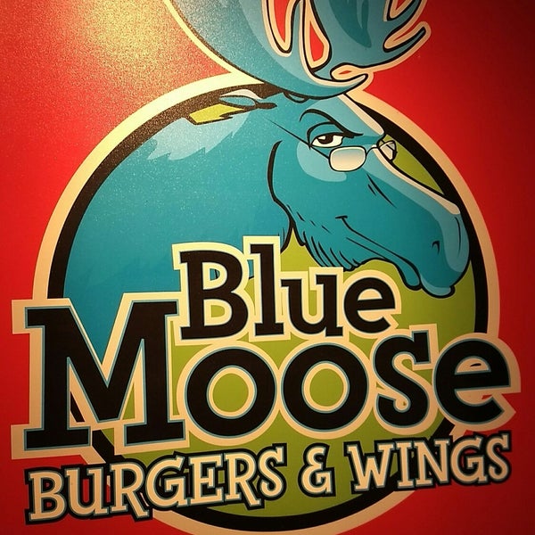 Photo taken at Blue Moose Burgers &amp; Wings by Dean V. on 7/23/2018