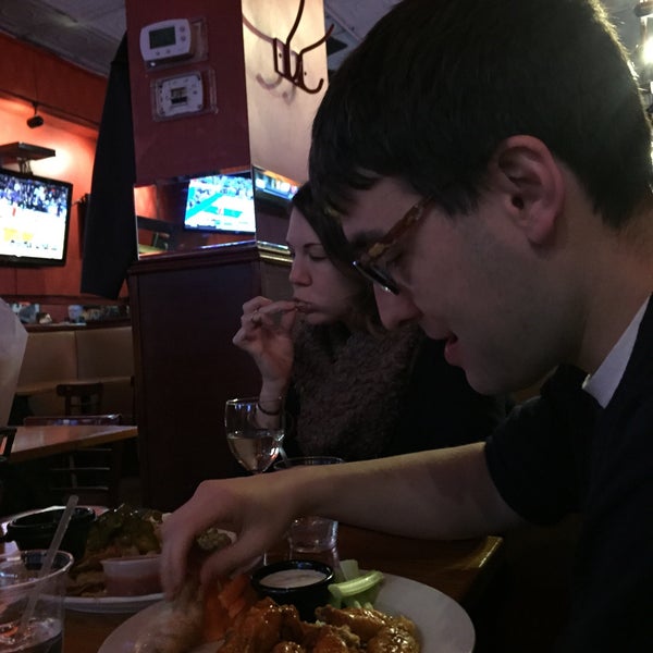 Photo taken at Cleveland Park Bar and Grill by Andrew L. on 1/9/2015
