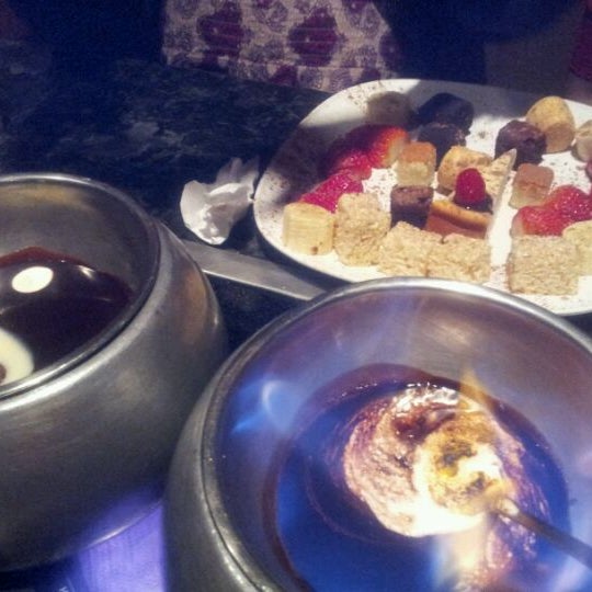 Photo taken at The Melting Pot by Valerie W. on 5/1/2012
