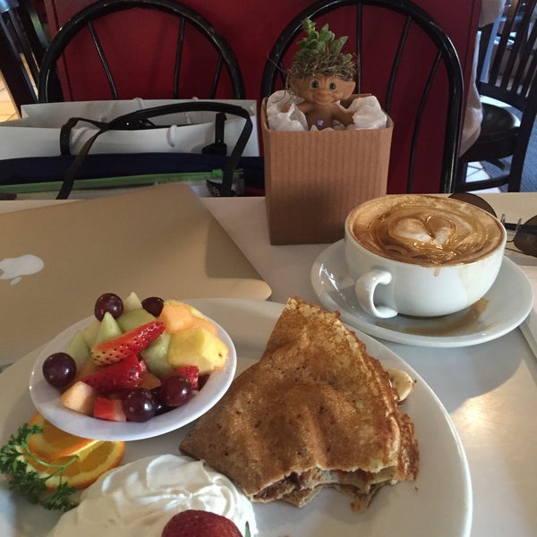 Photo taken at Elysee Café &amp; Bakery by Shil P. on 2/8/2016