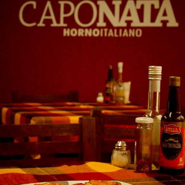 Photo taken at Caponata Horno Italiano by Pinche J. on 2/25/2014