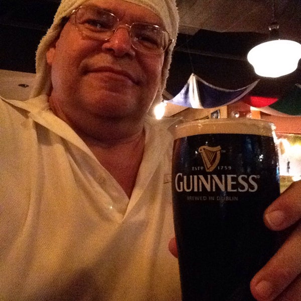 Photo taken at Tigin Irish Pub by Bob T. on 8/15/2015