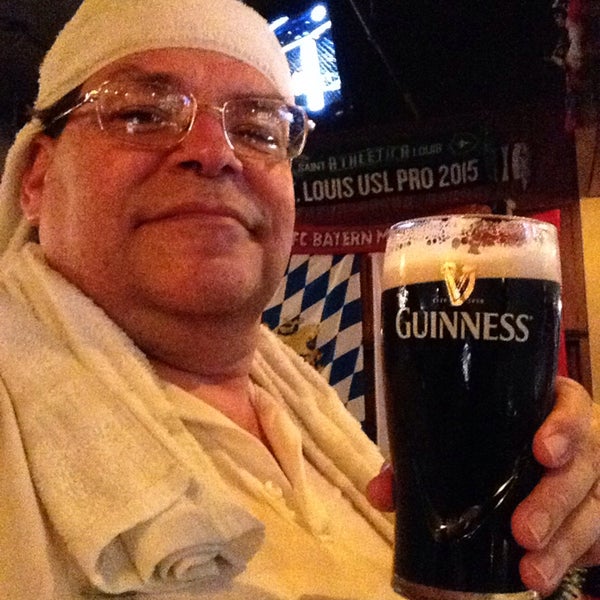 Photo taken at Tigin Irish Pub by Bob T. on 8/9/2015