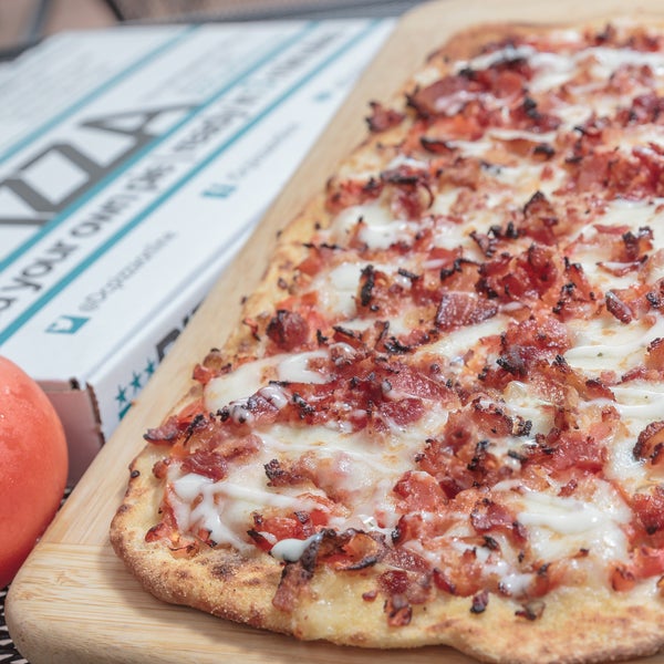 Try our latest creation, The BTR!  Fresh Mozzarella, Diced Tomatoes, Crispy Bacon, Ranch Dressing Drizzle. It's not even on our menu yet, just ask for the BTR.  YUMMY!!!