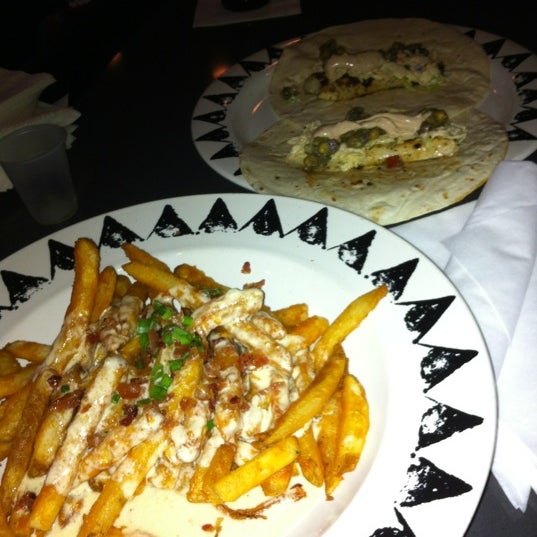 Foto scattata a Bojangles Bar &amp; Eatery da Chrissy F. il 12/15/2012