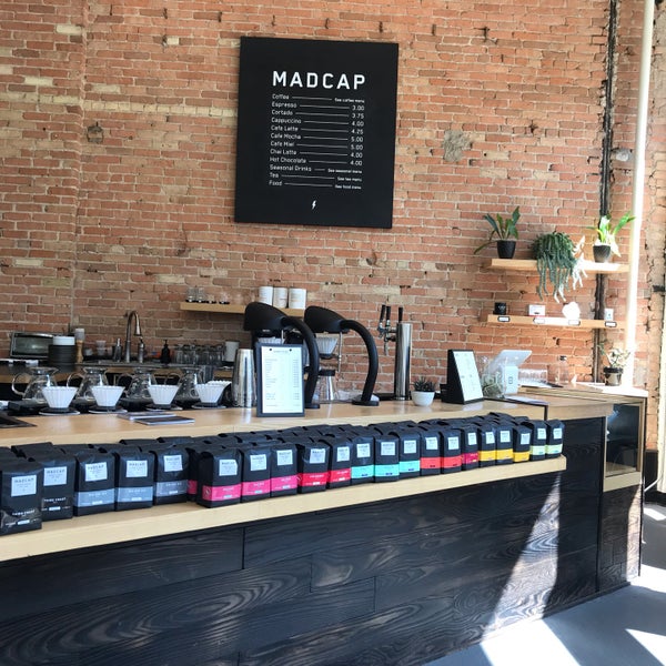 Photo taken at Madcap Coffee by Rachel L. on 6/3/2019