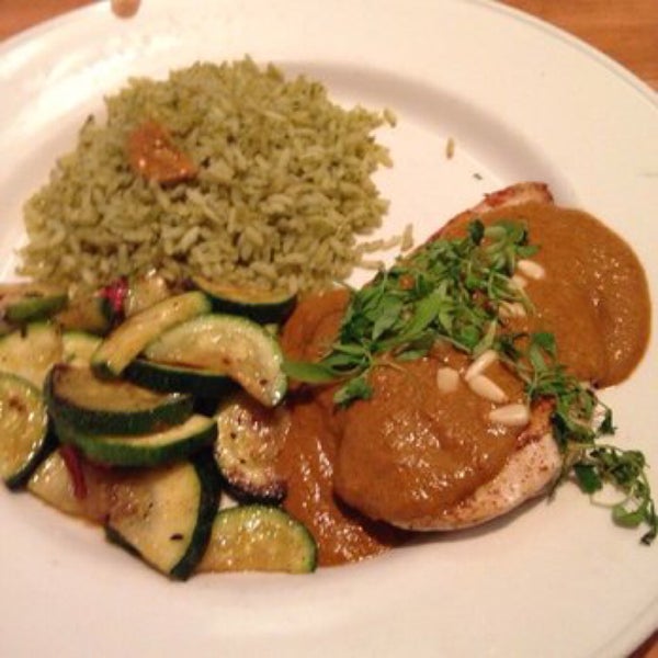 Pollo Mango Mole - grilled chicken with mango mole sauce and toasted pine nuts, veggies and rice.