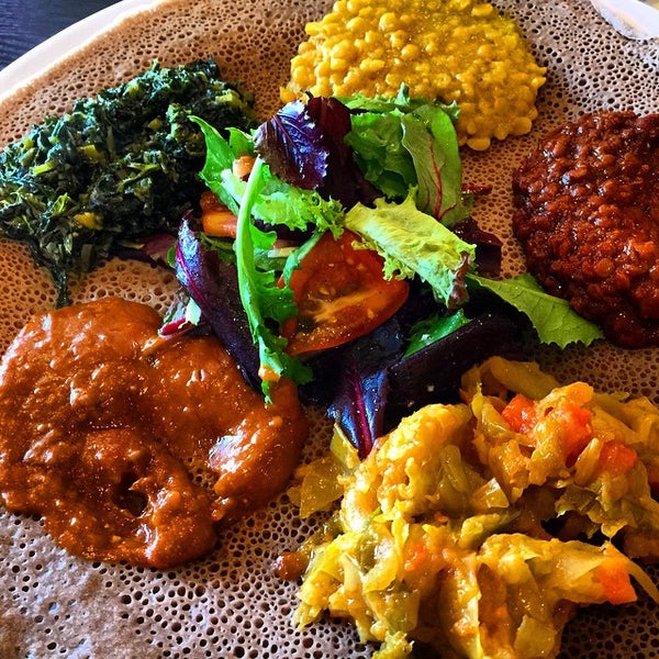 Foto diambil di Walia Ethiopian Cuisine oleh Mighty T. pada 11/30/2014