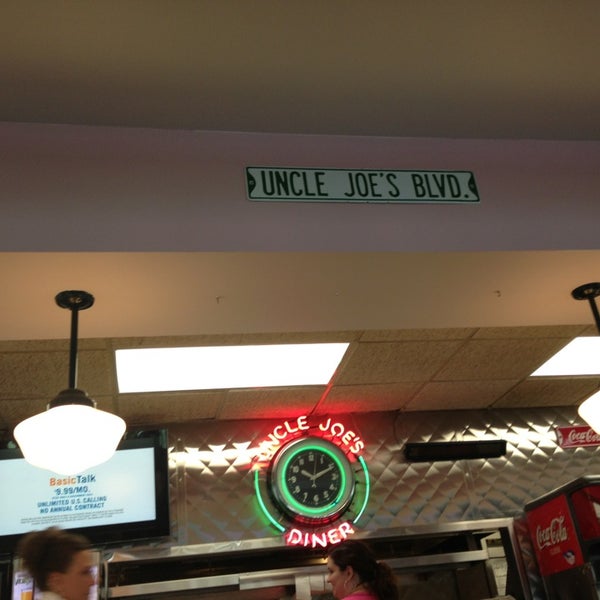 Photo taken at Uncle Joe&#39;s Diner by Ryan D. on 8/10/2013