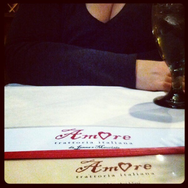 Photo taken at Amore Trattoria Italiana by Michael M. on 12/26/2012