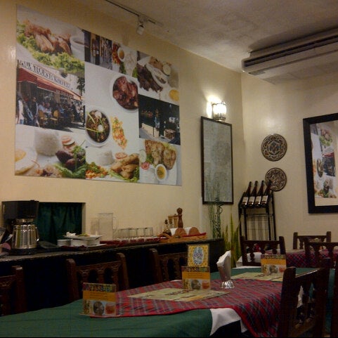 Photo taken at Galli Village Cafe by Rheena C. on 3/14/2013