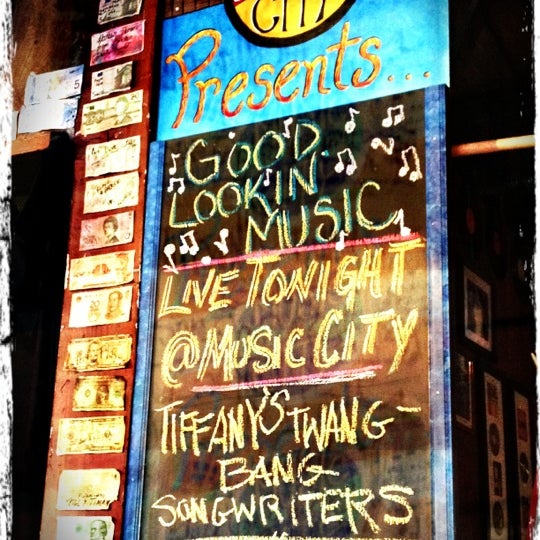Photo taken at Music City Bar and Grill by Tiffany M. on 9/19/2012