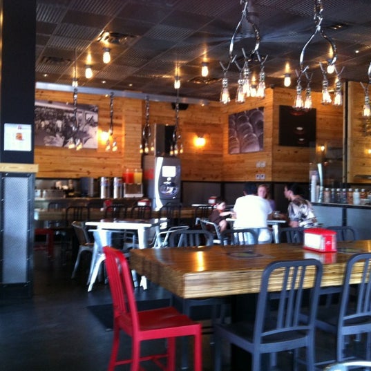 Photo taken at BurgerFi by Catherine W. on 9/21/2012
