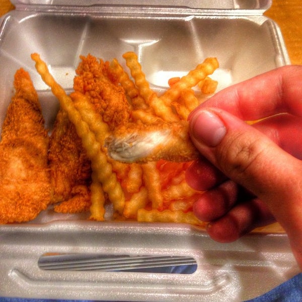 Photo taken at Raising Cane&#39;s Chicken Fingers by Thomas W. on 12/22/2014