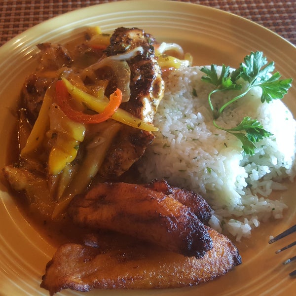 The Blackened Mango Chicken with Coconut Rice and Fried Sweet Plantain is absolutely delicious!