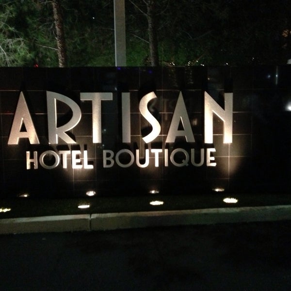 Photo taken at Artisan Hotel Boutique and Lounge by Brad L. on 8/24/2013