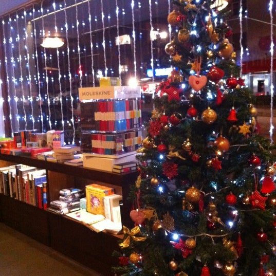 Photo taken at Bookish Store by Hulya on 12/7/2012