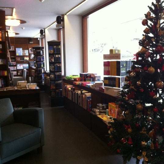 Photo taken at Bookish Store by Hulya on 12/5/2012