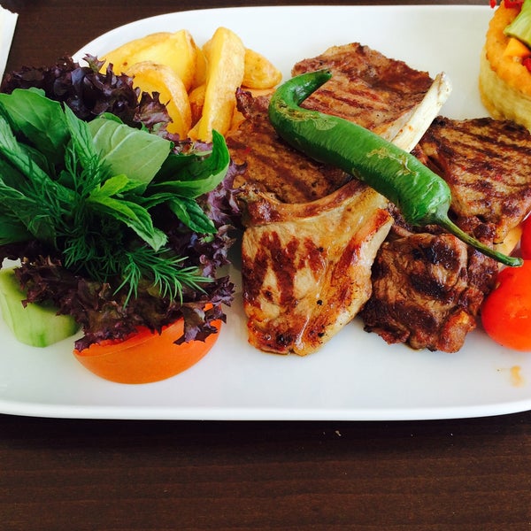 Photo taken at Bingüller Steak House &amp; Mangalda Et by Caner Ç. on 4/24/2015
