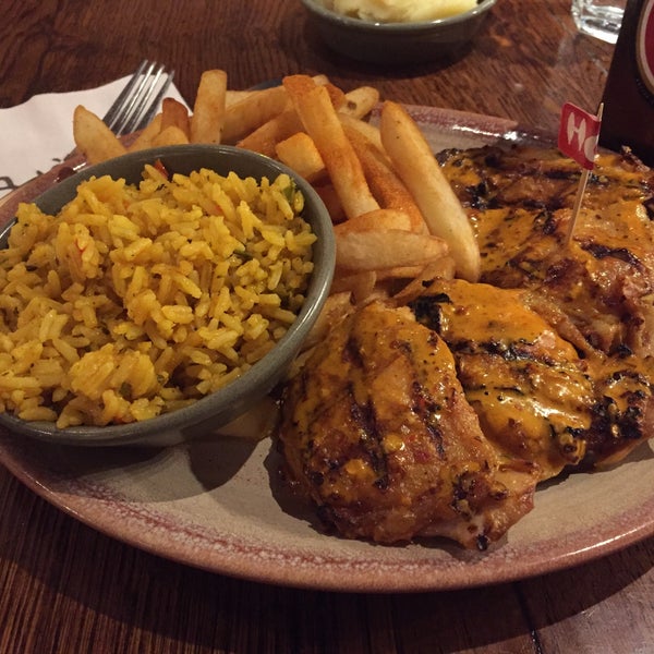 Photo taken at Nando&#39;s by C. D. on 4/1/2016