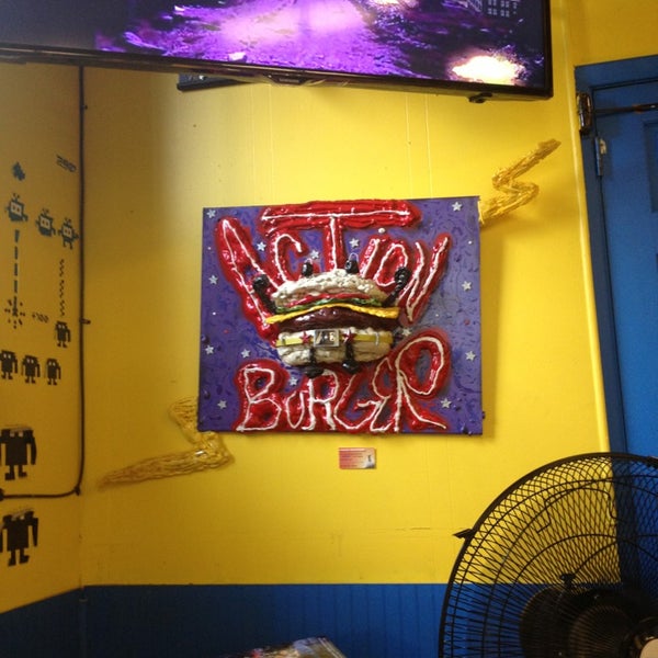 Photo taken at Action Burger by Ben S. on 7/19/2013
