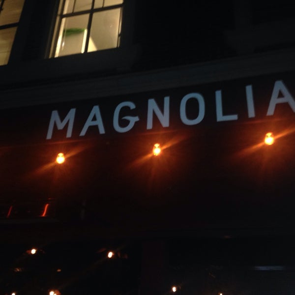 Photo taken at Magnolia Tap &amp; Kitchen by Carlos G. on 9/27/2014