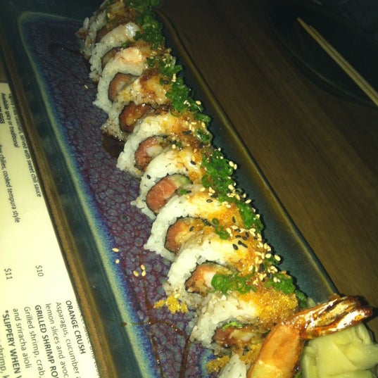 Photo taken at Sushi On The Rock by June P. on 12/8/2012