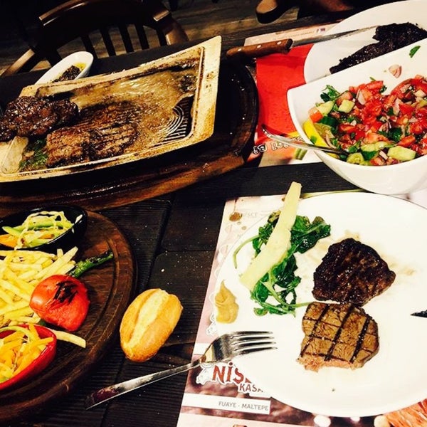 Photo taken at Nişet Steakhouse &amp; Lounge by Ebru S. on 9/20/2015