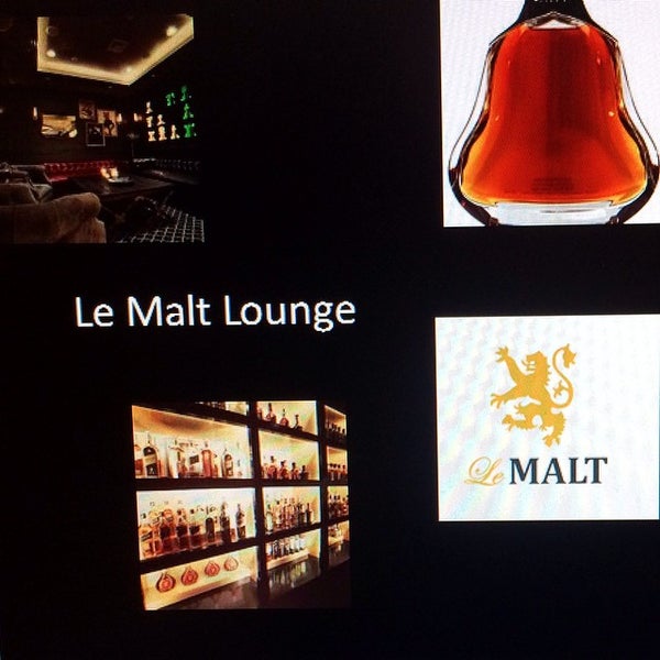 Photo taken at Le Malt Lounge by Adrienne T. on 12/11/2014