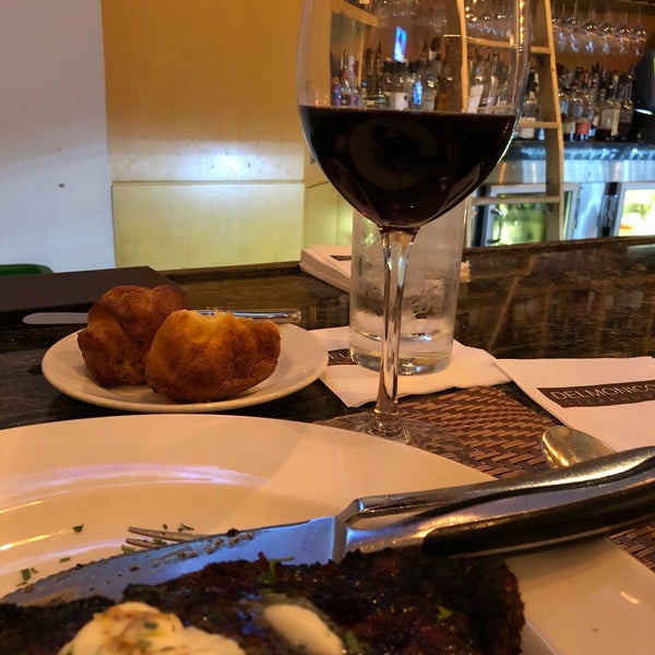 Photo taken at Delmonico Steakhouse by Mike G. on 8/23/2018