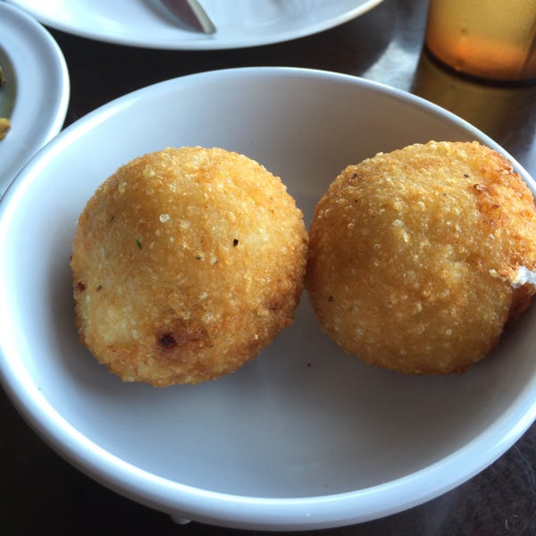 Fried risotto balls were delightful. Crispy risotto on the outside with warm cheese and sausage inside.