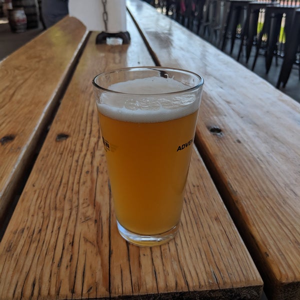 Photo taken at Hangar 24 Craft Brewery by Dennis on 6/12/2019