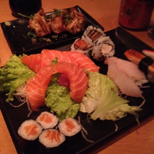 Photo taken at Kenzo Sushi Lounge by Simone P. on 8/19/2012