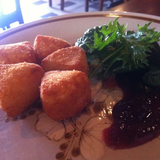 Yum! Camembert crumbed and deep fried served with cranberry compote!