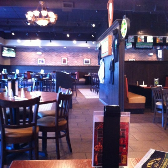 Photo taken at Dooney&#39;s Pub &amp; Restaurant by Sarah W. on 4/4/2012