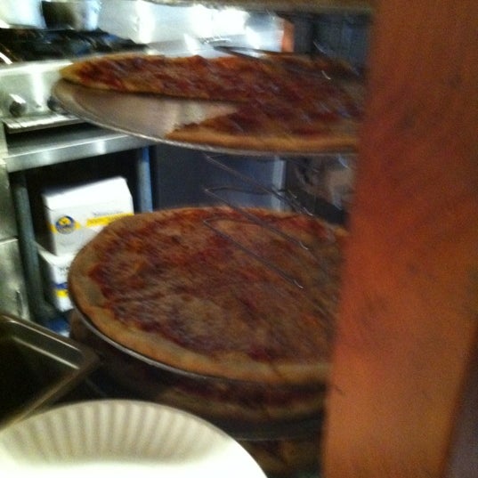 Photo taken at Manhattan Pizzeria by Sean N. on 9/2/2012