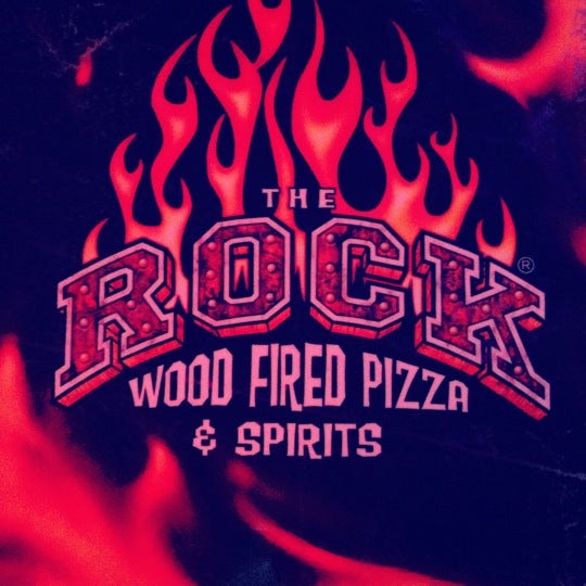 Photo taken at The Rock Wood Fired Pizza by Courtney on 6/24/2012