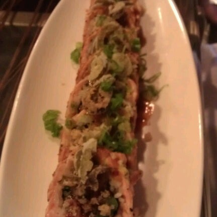 Photo taken at Dragonfly Sushi &amp; Sake Co by Meghan B. on 7/15/2012
