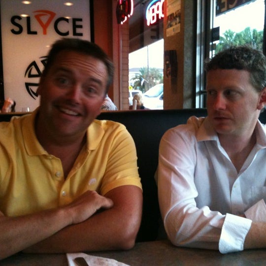 Photo taken at Slyce Pizza Bar by Abbey H. on 6/8/2012