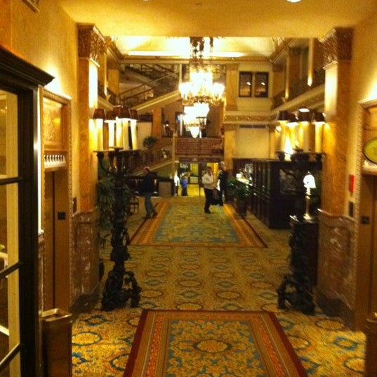 Photo taken at The Pfister Hotel by Mike R. on 3/10/2012