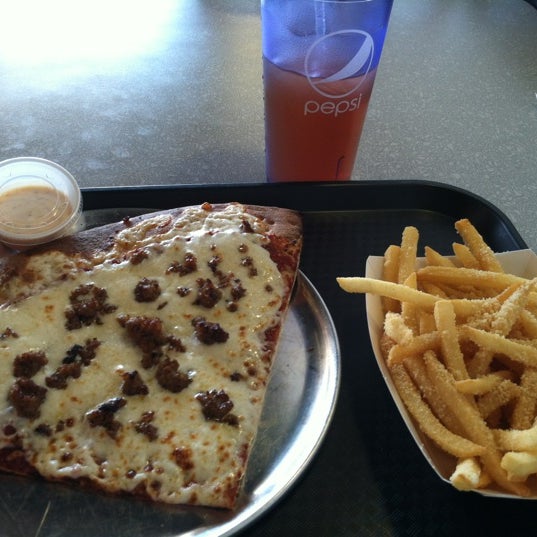 Photo taken at Lighthouse Pizza &amp; Fries by Robert M. on 8/3/2012